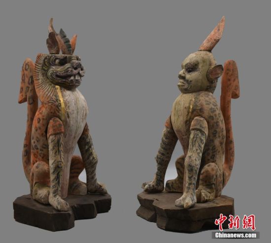 圖為慕容智墓出土鎮(zhèn)墓獸。 中新社發(fā) 甘肅省文物局 供圖